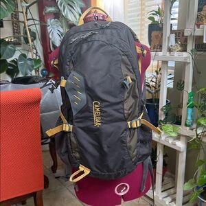 CamelBak Rim Runner X22 hydration bag. 22L, pre-loved.